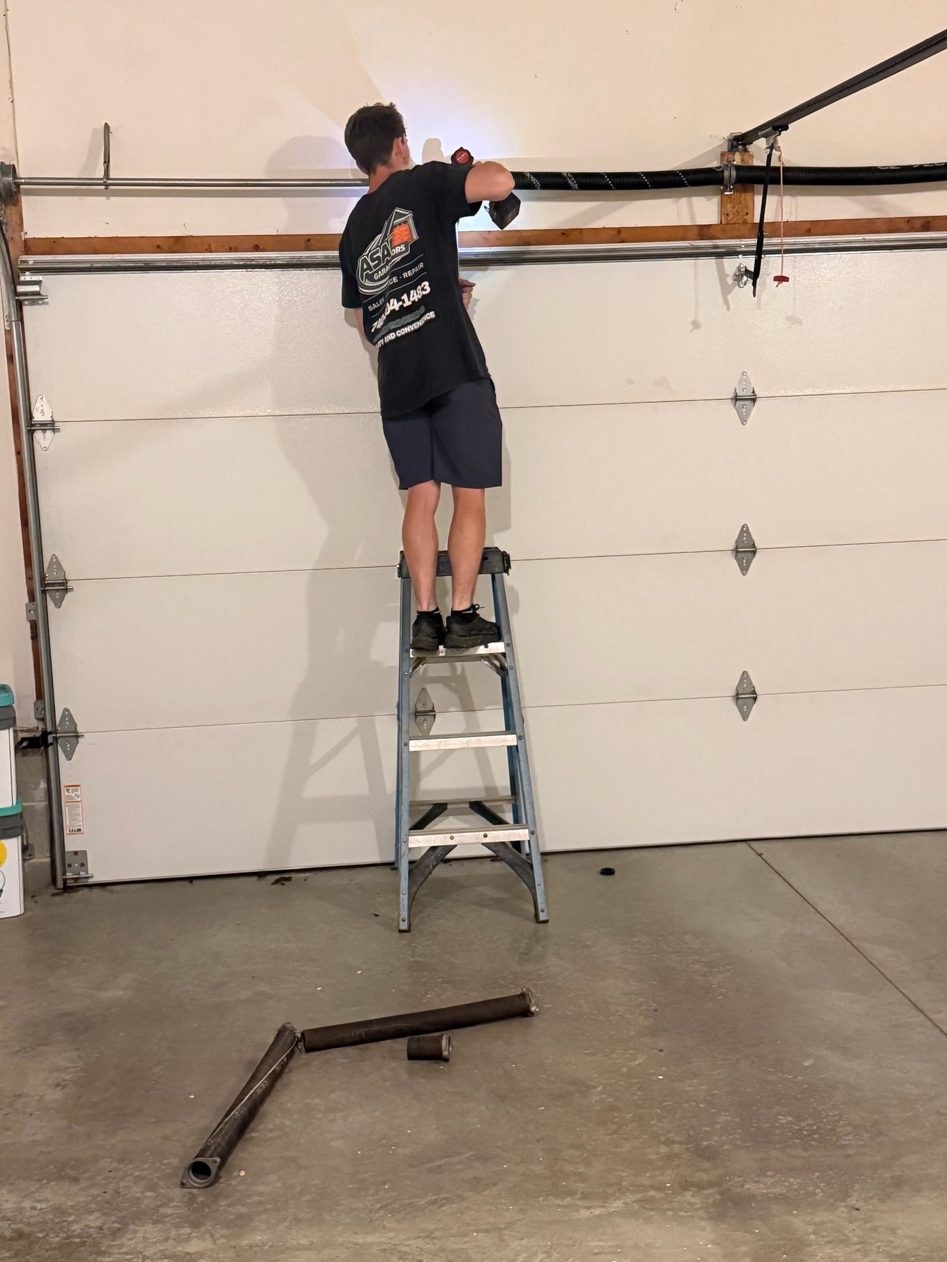 Broken Garage Door Spring Replaced and Back in Action image