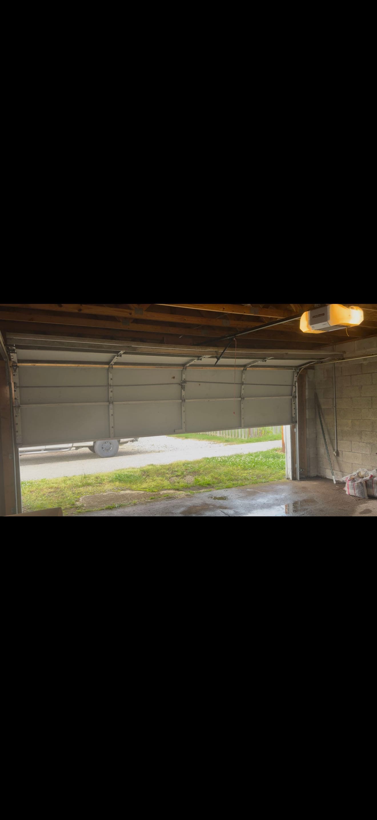 Gallery photos for Garage Door Off Track and Stuck Open - Fixed: Image #1