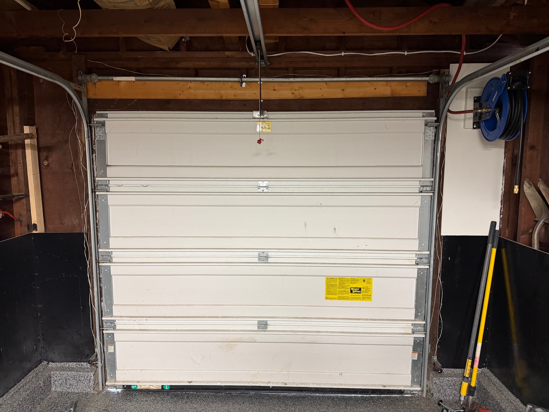 Gallery photos for Broken Garage Door Spring Replaced With a Longer-Lasting System: Image #1