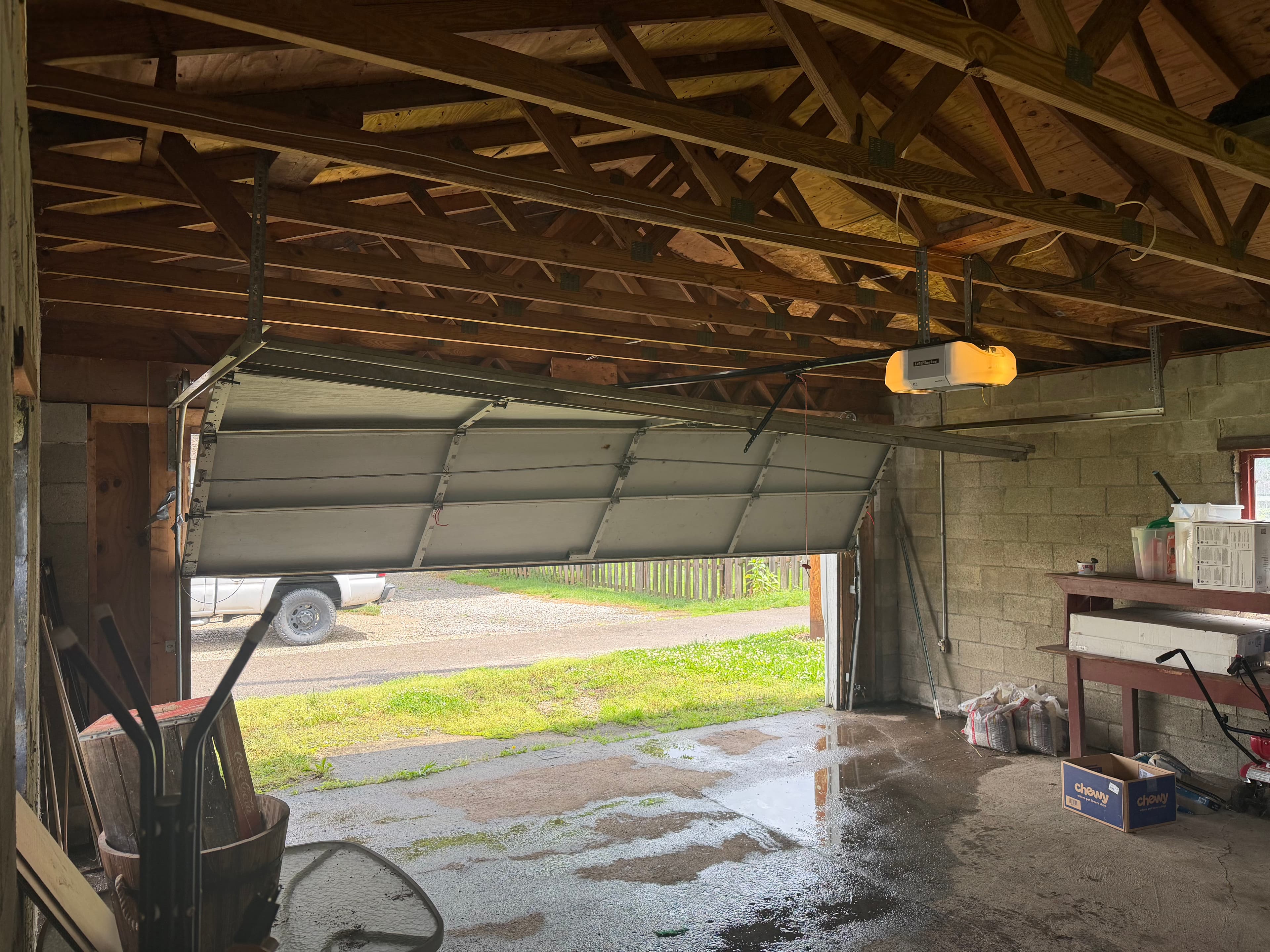Project Garage Door Off Track and Stuck Open - Fixed image