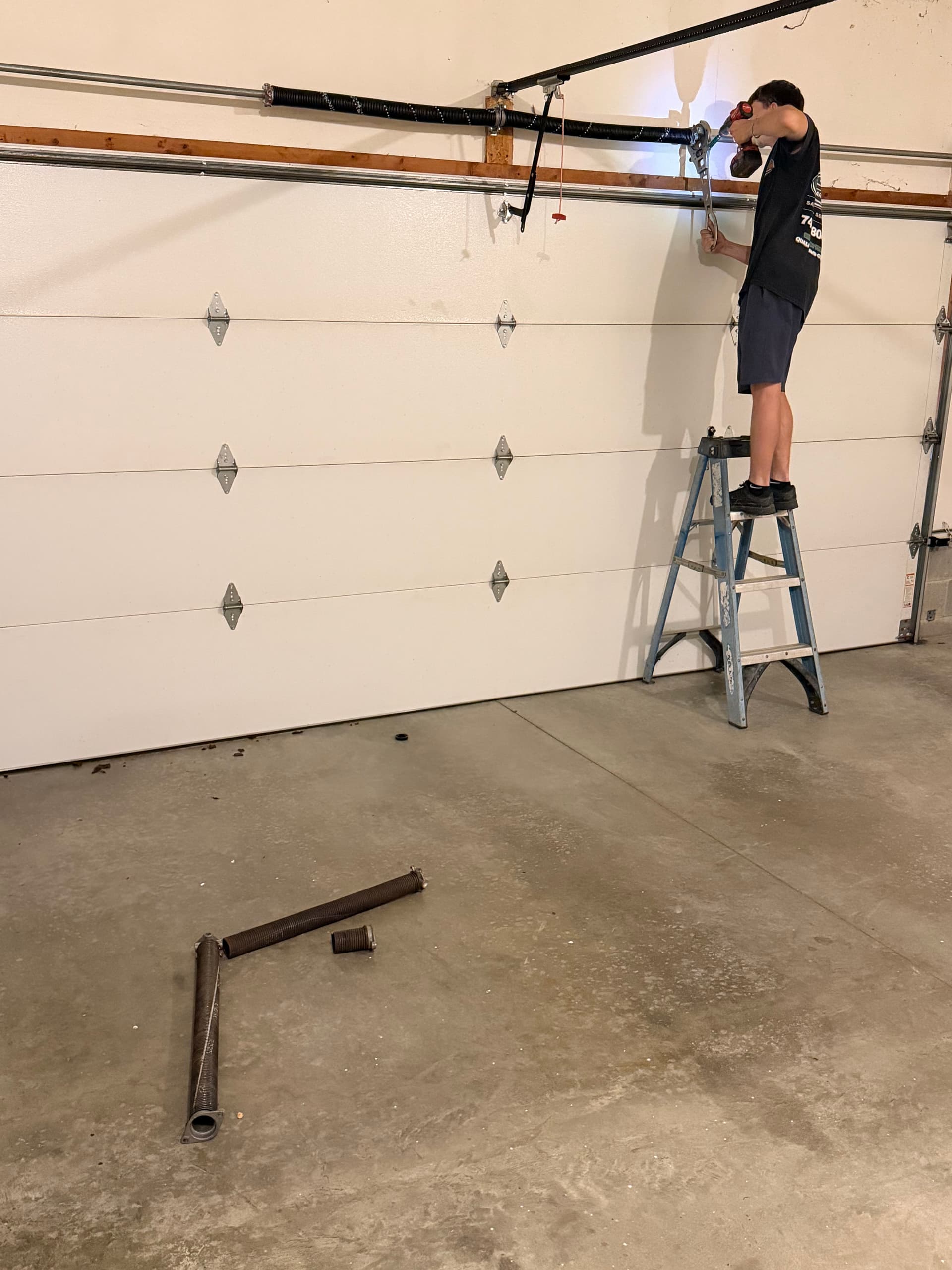 Gallery photos for Broken Garage Door Spring Fixed and Back in Action: Image #1